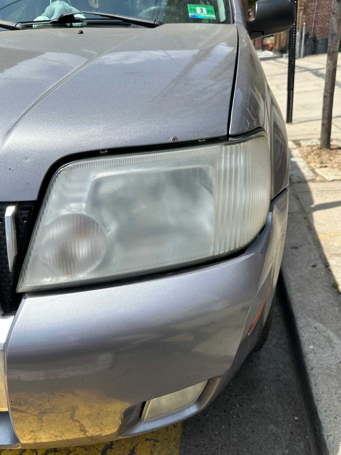 Ford SUV — NJ Customer headlight before restoration